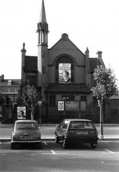 black and white image of the church with Billy Graham Banner outside from the 1980&apos;s