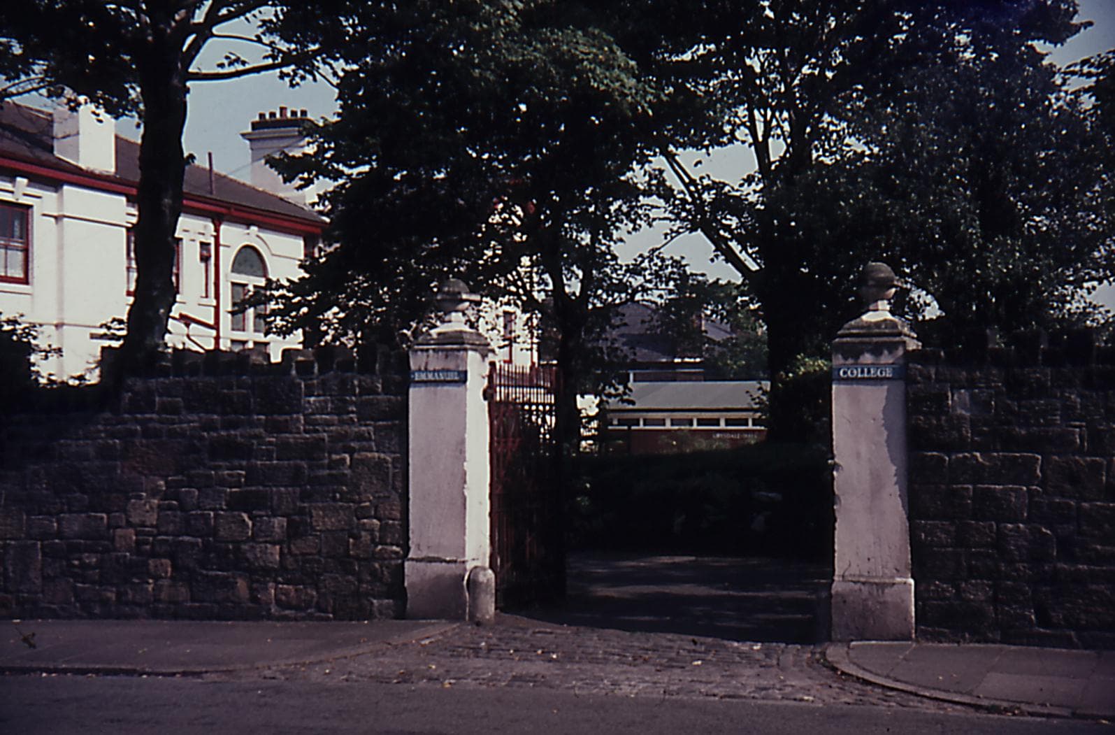Image of Emmanuel Bible College from the gates at Palm Grove side 