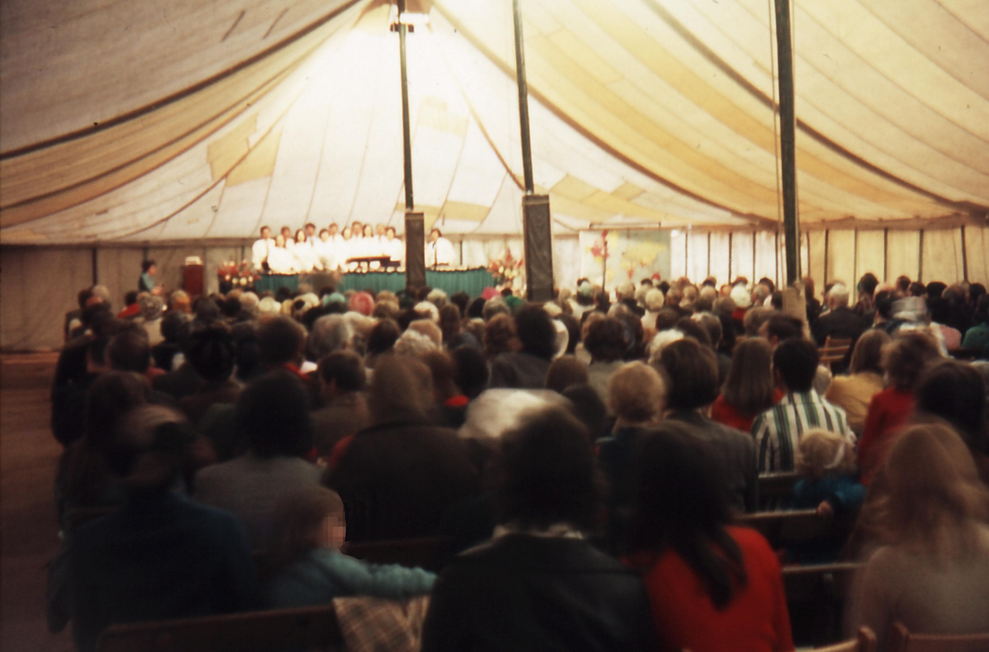 Image of the Missionary Convention Tent full of people